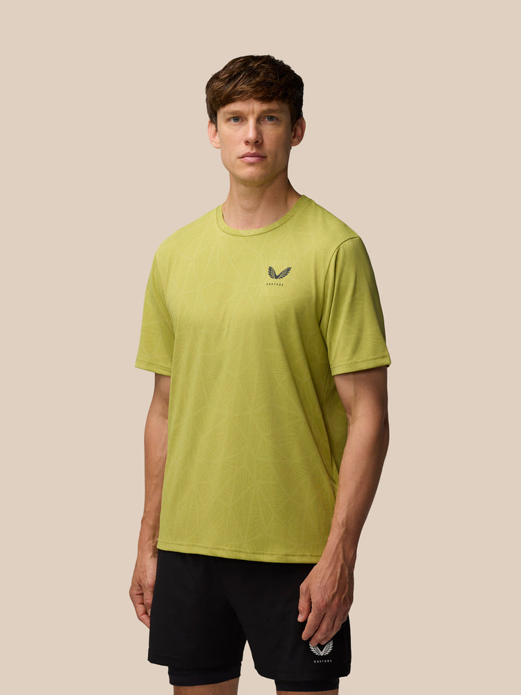 Flow Training Engineered Gewebtes T-Shirt – Senf