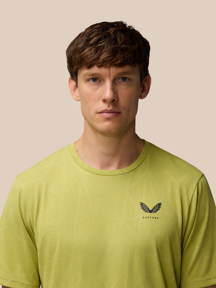 Flow Training Engineered Gewebtes T-Shirt – Senf