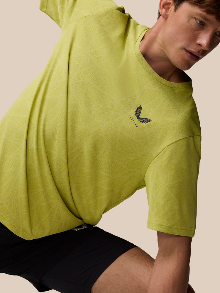 Flow Training Engineered Gewebtes T-Shirt – Senf
