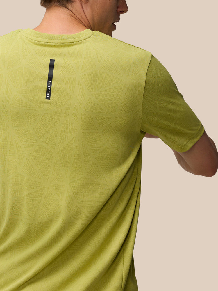 Flow Training Engineered Gewebtes T-Shirt – Senf