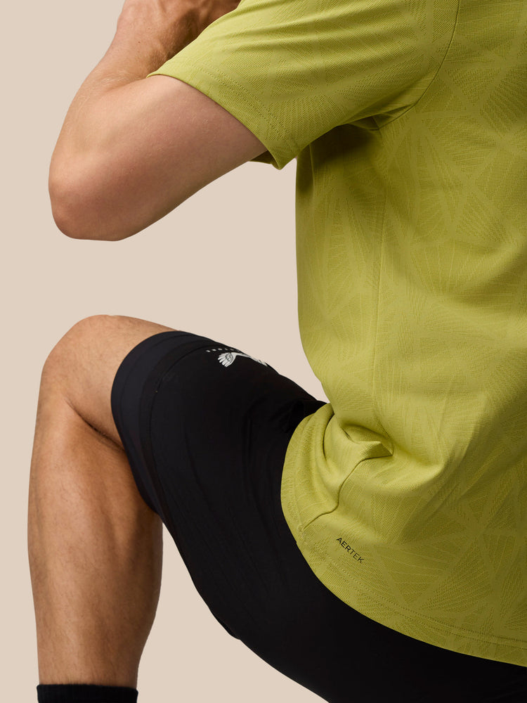 Flow Training Engineered Gewebtes T-Shirt – Senf