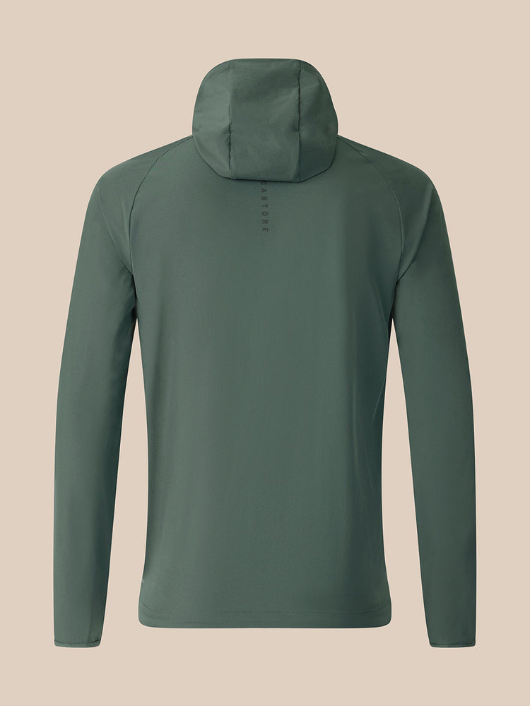 Dark green jacket on a beige background