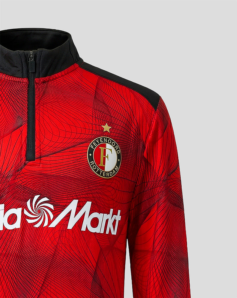 Chest close up of red Feyenoord midlayer top with club crest and MediaMarkt sponsor