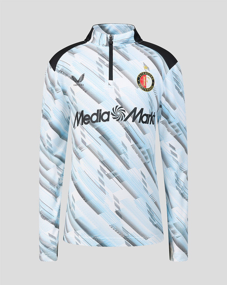 Front view of junior Feyenoord away midlayer top with pale blue abstract print and club crest.