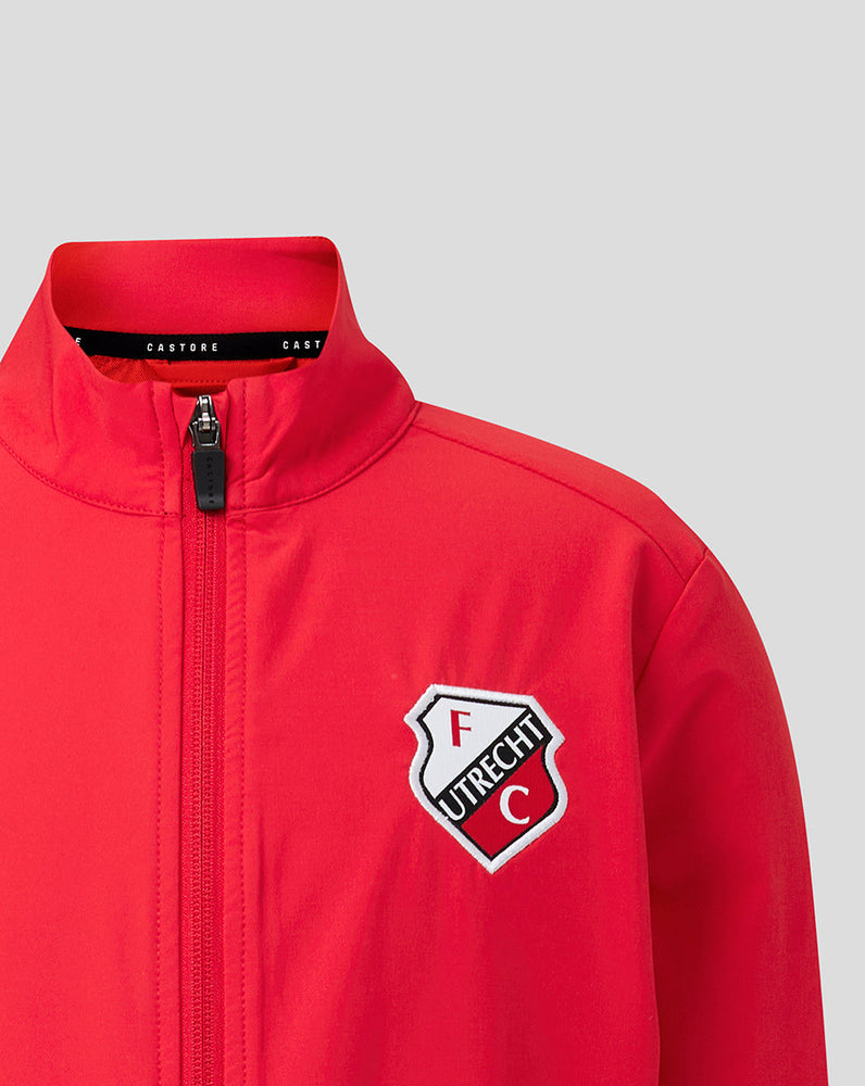 Close up of red FC Utrecht jacket with front zipper and chest crest
