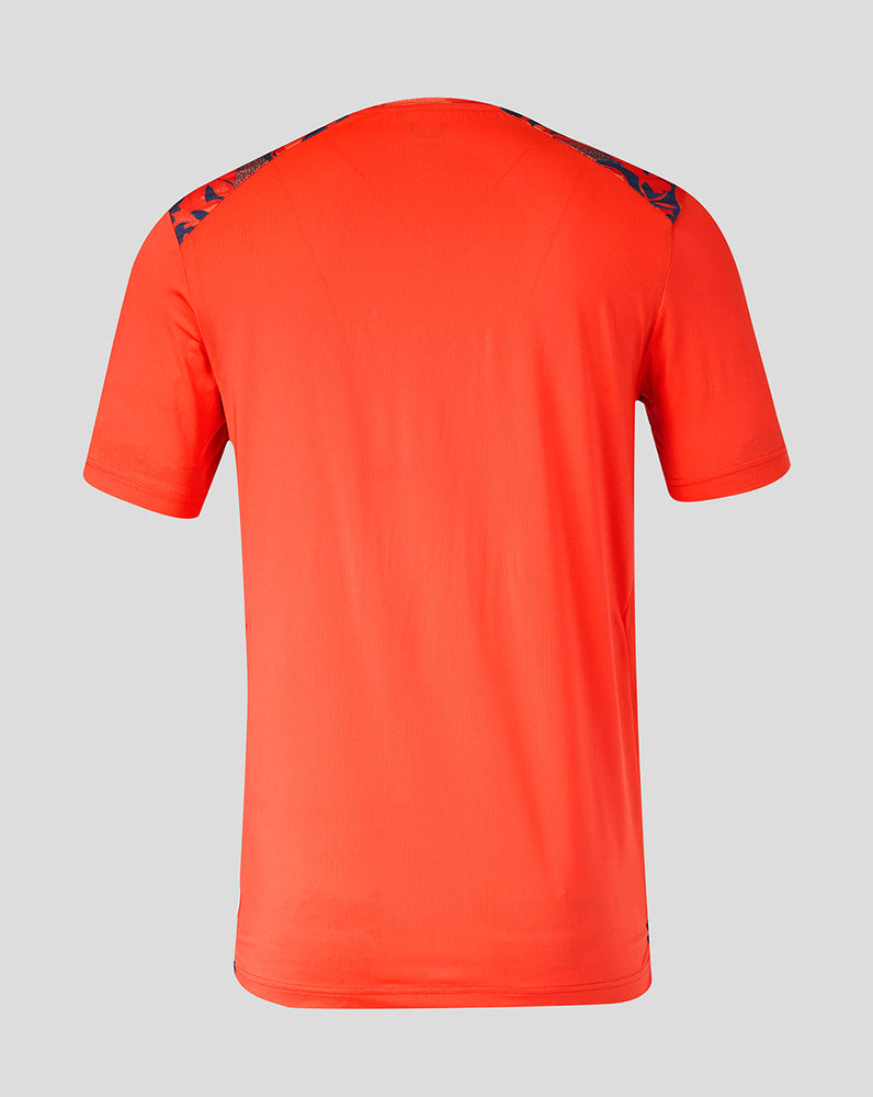 Back view of orange Feyenoord Derde Matchday shirt with navy shoulder pattern.