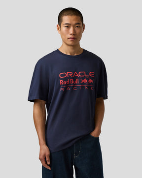 Person wearing a navy blue 'Oracle Red Bull Racing' t-shirt on a plain background