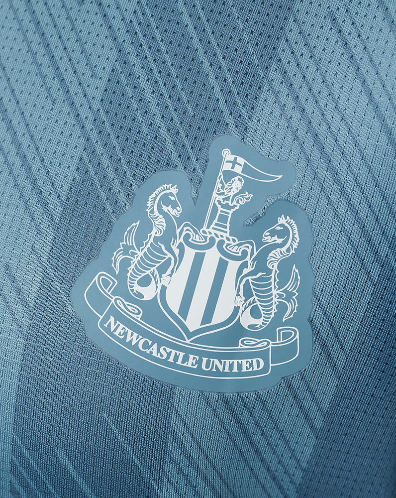 Newcastle United Junior 23/24 Spieler-Trainings-T-Shirt – Blau