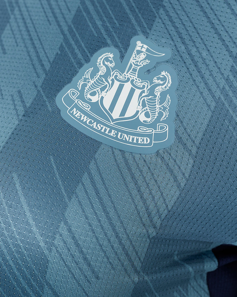 Newcastle United Langarm-Trainings-T-Shirt für Junioren 23/24 Spieler – Blau