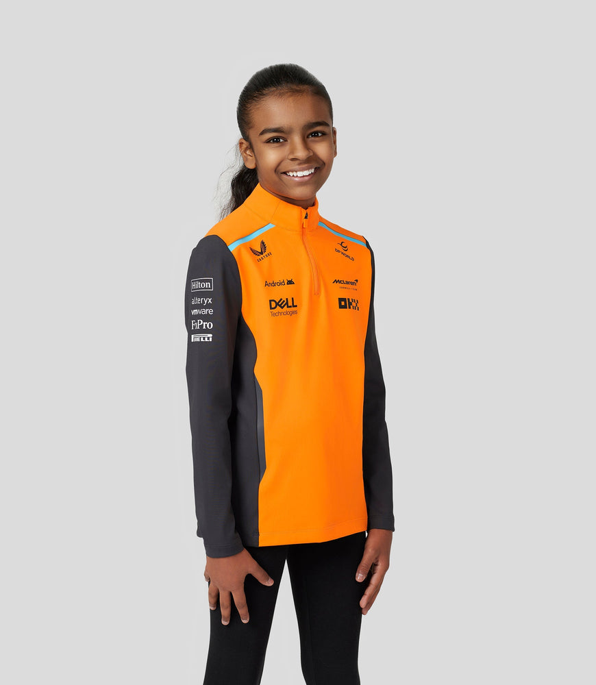 Junior McLaren Offizielles Teamwear-Oberteil mit Viertelreißverschluss Oscar Piastri Formel 1